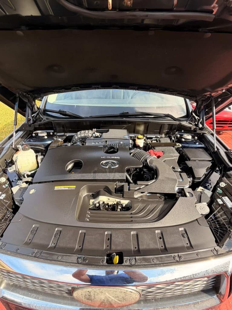 Close-up of a clean Infiniti VC-Turbo engine under an open hood